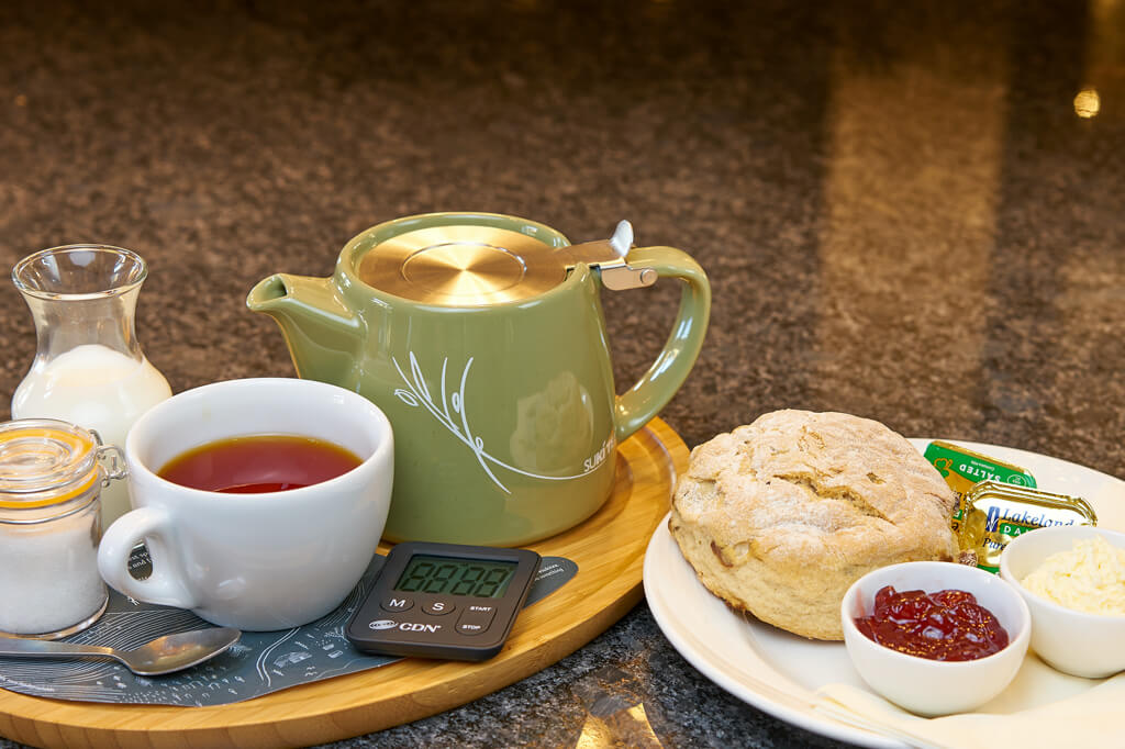 Tea and scone served at inverness palace hotel & spa