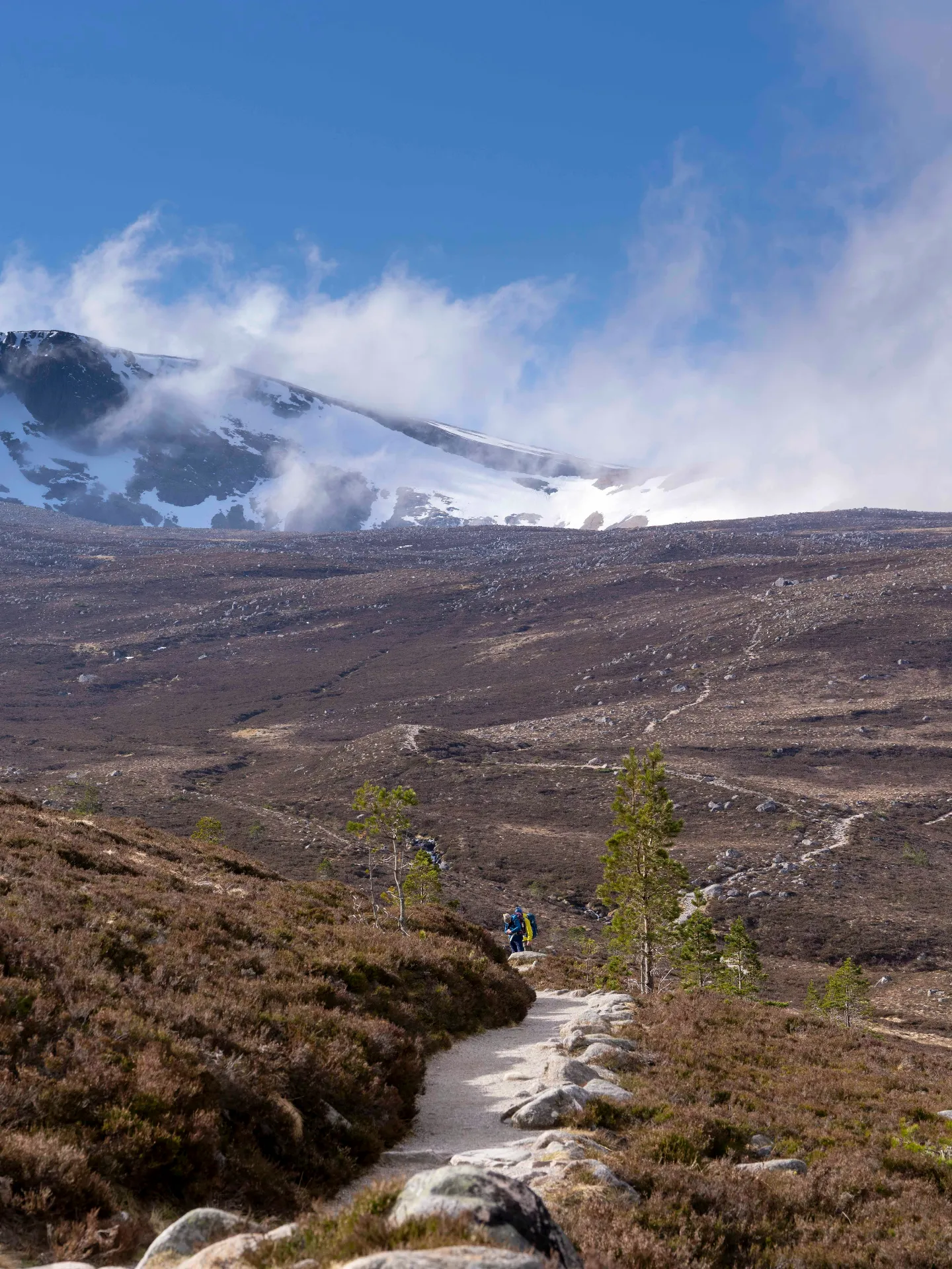 Cairngorms National Park Hiking Trail Scotland Hikers on a mountain trail in cairngorms national park, scotland